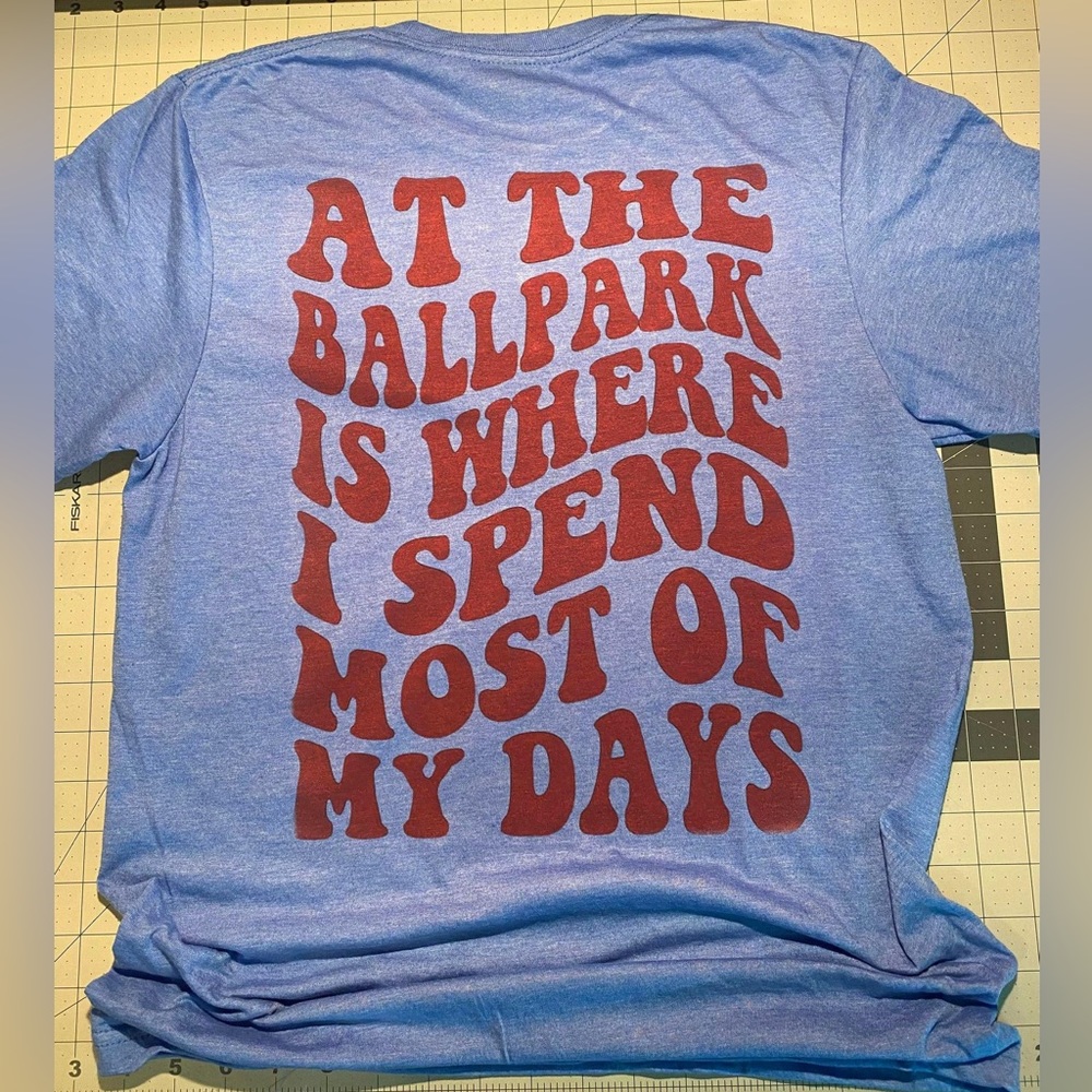 At the ball park. Baseball tee